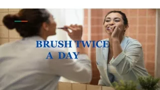 BRUSH TWICE    A  DAY